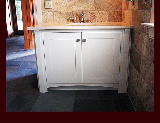 Painted Bath Vanity. Decorative flat column with corbel. Decorative arch kick.