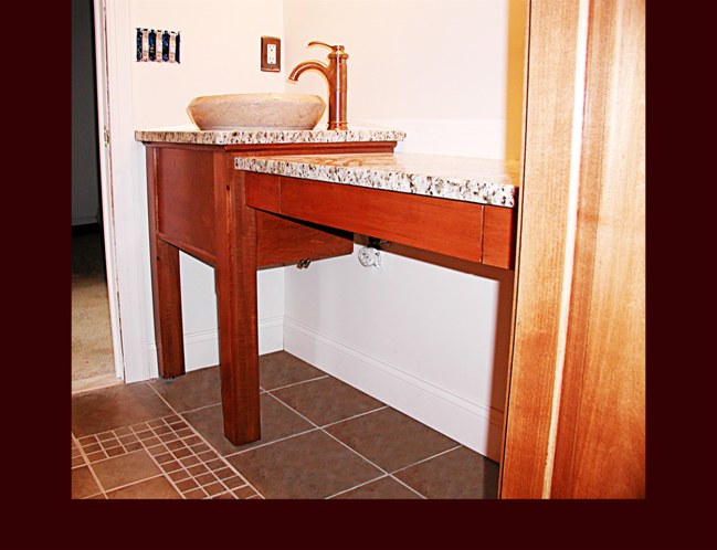 Maple vanity with flat skirting and posts. Attached dressing table with drawer.
