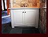 Painted Bath Vanity. Decorative flat column with corbel. Decorative arch kick.