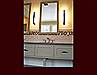 Bathroom vanity with framed mirrors to match.