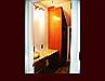 Maple bath cabinetry. Sink cabinet, dressing table, wardrobe and drawer built-ins.