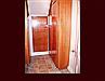 Bathroom cabinetry. Raised Panel Wardrobe built-ins with shelves. Drawer built-in under staircase.