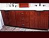 Stained Cherry Bathroom Vanity. Double sink with center drawers. Above vanity upper cabinet.