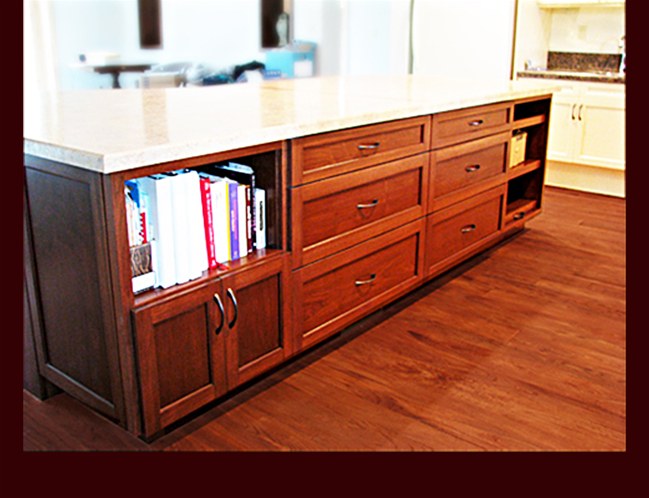 Custom Kitchen Island with bookcase, pots & pans drawers, basket storage pullouts.