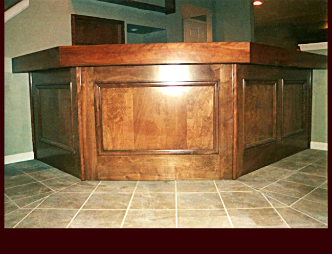 Stained Birch Bar. Flat Panel with applied moulding.