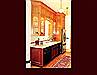 Cherry Kitchen Cabinetry. Flat Panel door style with applied moulding.