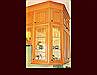 Cherry Kitchen Cabinets. Two tiered upper wall cabinets. 10' ceiling height.