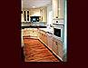 Painted Custom Maple Kitchen cabinets. Flat Panel door style with laminated countertops.