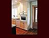 Custom Maple Kitchen. Decorative end panels. Crown Molding