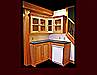 Custom Oak Kitchenette. Flat Panel door style. Glass door upper cabinets. Crown Molding.